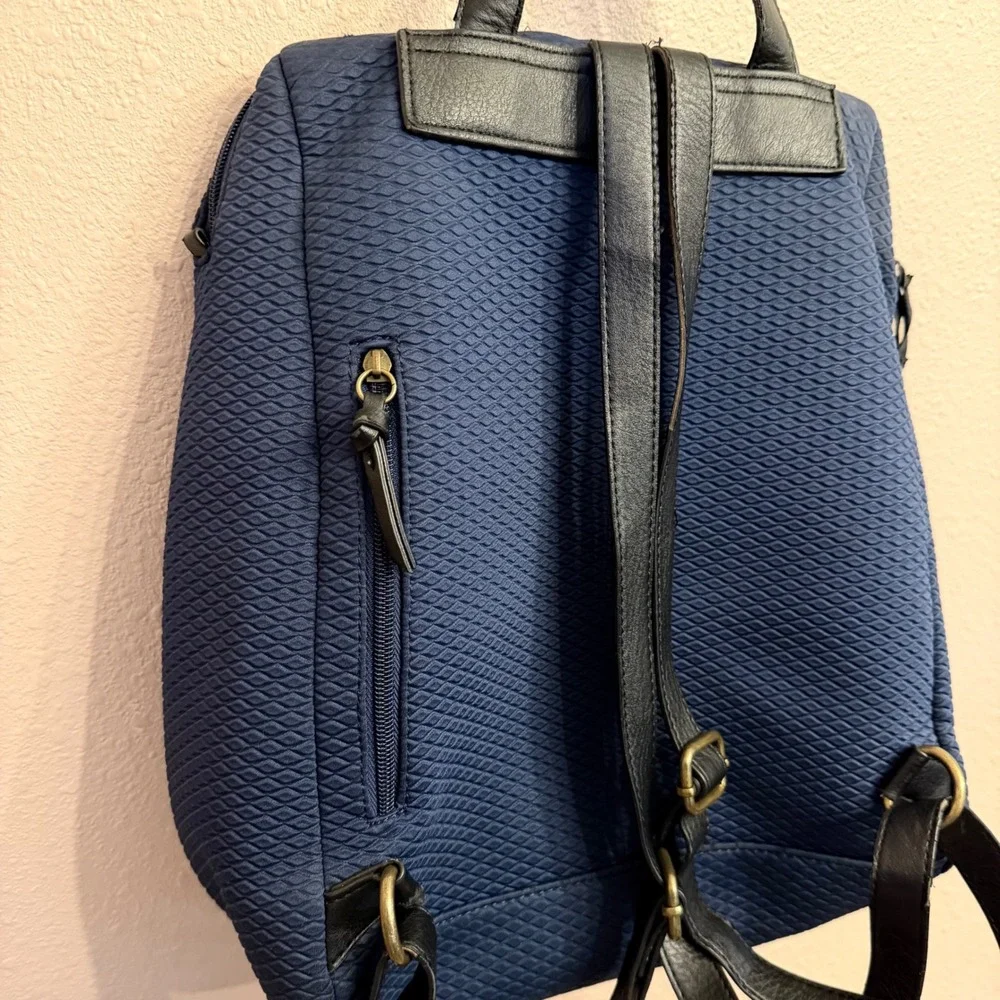 The Sak Navy Blue Textured Diamond Quilted Backpack Bag with Black Straps